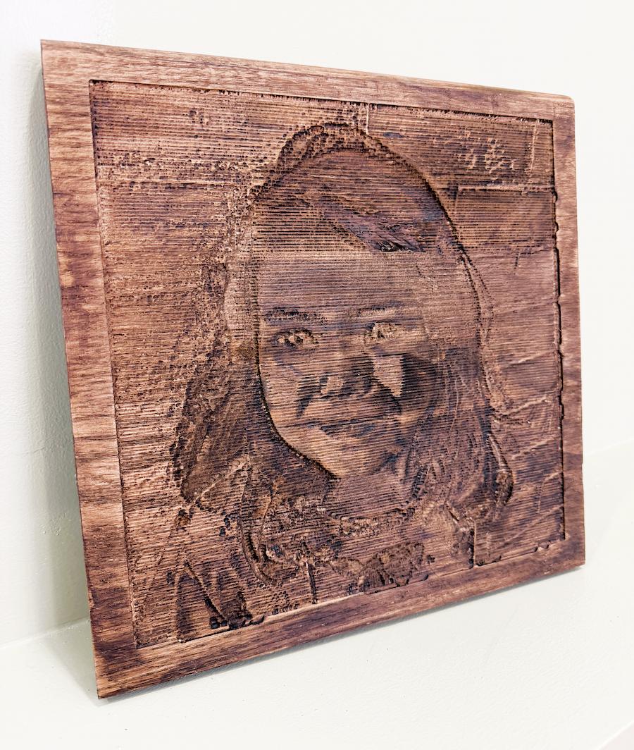 Image of wooden portraits